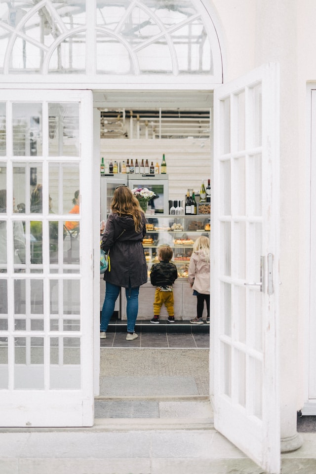 white french doors of a local bakery